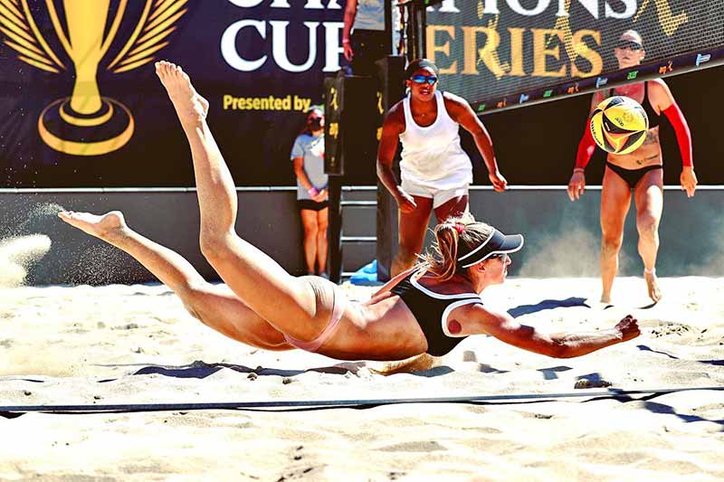 Junior athletes training on the sand at Sunset Park